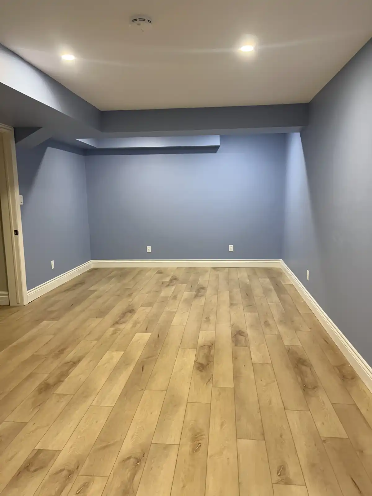basement finishing contractors - finished room
